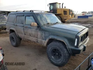 1997 Jeep Cherokee Country with VIN 1J4FJ78SXVL566804, listed as a Copart auction lot 88557395 with 216,230 mi miles and Salvage title. Bid and sale history available at DreamBid. Image 4.