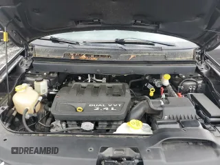 2015 Dodge Journey American Value z VIN 3C4PDCAB6FT649933, wystawiony jako Copart lot #54404415 z przebiegiem 144 830 mil mil oraz Szkoda całkowita • Salvage title. Historia ofert i sprzedaży dostępna na DreamBid. Obrazek 12.