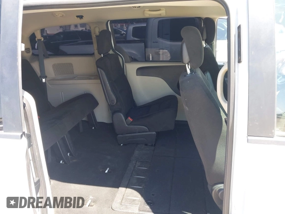 2016 Dodge Grand Caravan SE with VIN 2C4RDGBG2GR311654, listed as a IAAI auction lot 42056032 with 185,330 mi miles and . Bid and sale history available at DreamBid. Image 8.