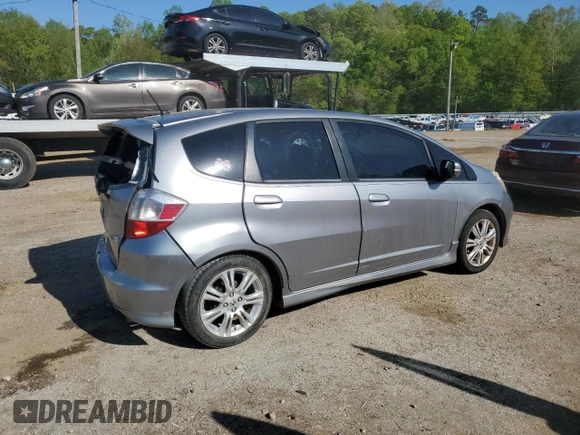 2009 Honda Fit Sport с VIN JHMGE88459S048194, выставлен на аукционе Copart как лот 52581055 с пробегом 177 290 миль миль и Списание • Salvage title. История ставок и продаж доступна на DreamBid. Изображение 3.