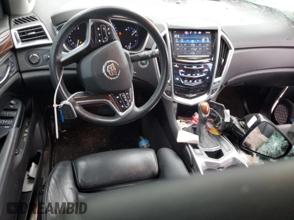 2015 Cadillac SRX Luxury Collection z VIN 3GYFNEE31FS618855, wystawiony jako Copart lot #54868505 z przebiegiem 111 612 mil mil oraz Szkoda całkowita • Salvage title. Historia ofert i sprzedaży dostępna na DreamBid. Obrazek 8.