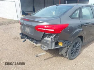 2018 Ford Focus SE with VIN 1FADP3F29JL288761, listed as a IAAI auction lot 42290510 with 93,463 mi miles and . Bid and sale history available at DreamBid. Image 19.
