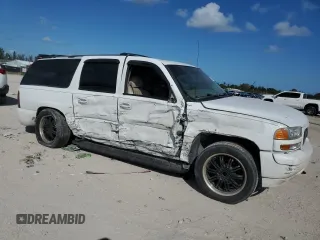 2001 GMC Yukon XL SLT with VIN 1GKEC16T51J253741, listed as a Copart auction lot 77461934 with 0 mi miles and Salvage Title. Bid and sale history available at carsss.com. Image 4.