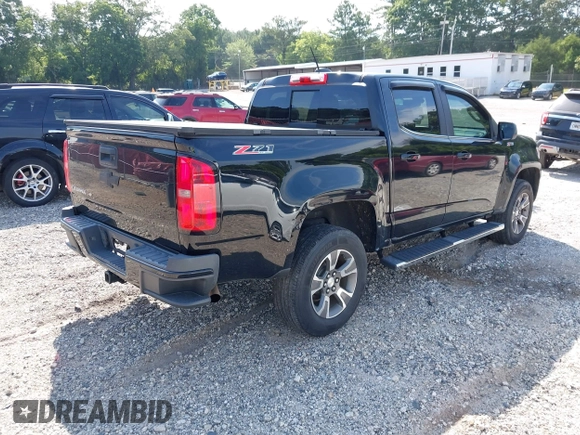 2018 Chevrolet Colorado 2WD Z71 with VIN 1GCGSDEN3J1309462, listed as a IAAI auction lot 42632940 with 85,886 mi miles and . Bid and sale history available at DreamBid. Image 4.
