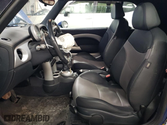 2007 MINI Convertible with VIN WMWRF33507TG16448, listed as a Copart auction lot 88474495 with 148,147 mi miles and Salvage Title. Bid and sale history available at DreamBid. Image 7.