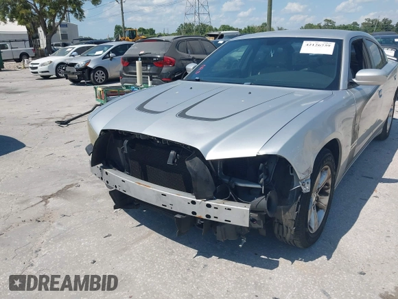 2012 Dodge Charger SE with VIN 2C3CDXBG5CH119493, listed as a IAAI auction lot 42126739 with 138,464 mi miles and . Bid and sale history available at carsss.com. Image 6.