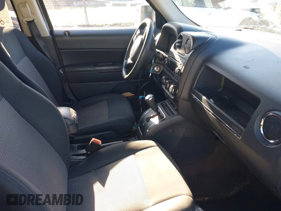 2014 Jeep Patriot Sport with VIN 1C4NJPBA0ED690284, listed as a IAAI auction lot 42513472 with 148,979 mi miles and . Bid and sale history available at DreamBid. Image 5.