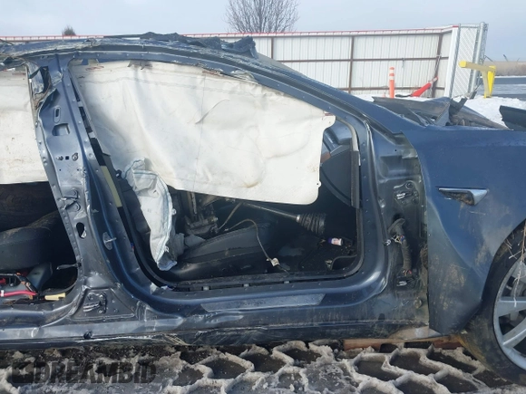 2020 Tesla Model 3 Long Range z VIN 5YJ3E1EB9LF787390, wystawiony jako IAAI lot #41614394 z przebiegiem Nie podano mil oraz . Historia ofert i sprzedaży dostępna na DreamBid. Obrazek 12.