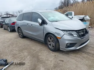 2018 Honda Odyssey EX-L with VIN 5FNRL6H74JB002985, listed as a IAAI auction lot 41795084 with 76,246 mi miles. Bid and sale history available at carsss.com. Image 1.