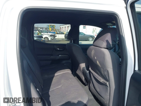2017 Toyota Tacoma SR5 with VIN 3TMAZ5CN9HM031576, listed as a IAAI auction lot 41457373 with 166,219 mi miles and . Bid and sale history available at DreamBid. Image 8.