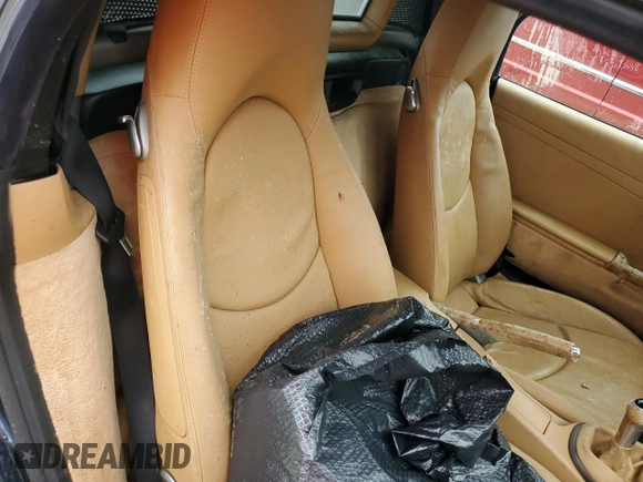 2005 Porsche Boxster с VIN WP0CA29875U713041, выставлен на аукционе Copart как лот 74948004 с пробегом Не указан миль и Списание • Salvage title. История ставок и продаж доступна на DreamBid. Изображение 10.