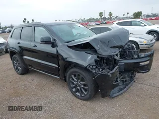 2018 Jeep Grand Cherokee Overland with VIN 1C4RJFCG1JC424108, listed as a IAAI auction lot 42372298 with 42,438 mi miles and . Bid and sale history available at DreamBid. Image 1.