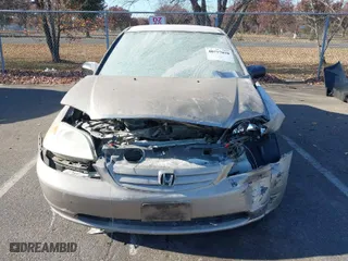 2002 Honda Civic LX with VIN 2HGES16642H552358, listed as a IAAI auction lot 40757858 with 138,320 mi miles. Bid and sale history available at carsss.com. Image 12.