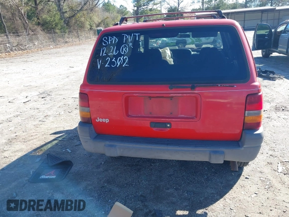 1996 Jeep Grand Cherokee Laredo with VIN 1J4EX58S8TC122302, listed as a IAAI auction lot 41218573 with 195,392 mi miles. Bid and sale history available at carsss.com. Image 16.