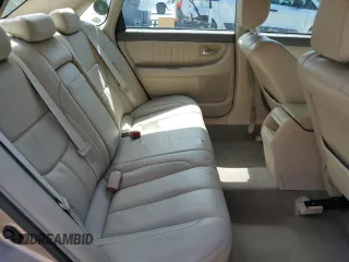 2002 Toyota Avalon XL z VIN 4T1BF28B72U261478, wystawiony jako Copart lot #57638745 z przebiegiem 146 479 mil mil oraz Szkody całkowita. Historia ofert i sprzedaży dostępna na DreamBid. Obrazek 10.