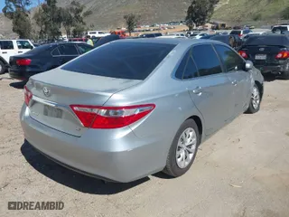2015 Toyota Camry XLE with VIN 4T4BF1FK9FR499888, listed as a IAAI auction lot 41676657 with 148,310 mi miles. Bid and sale history available at carsss.com. Image 4.