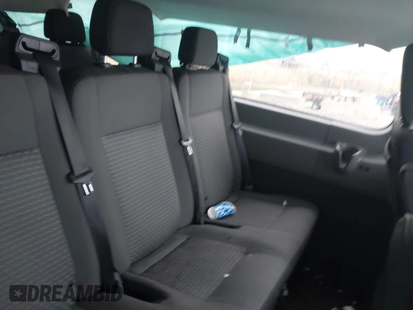 2023 Ford Transit Passenger XL with VIN 1FBAX2YG1PKA92302, listed as a IAAI auction lot 42187709 with 76,445 mi miles. Bid and sale history available at carsss.com. Image 8.