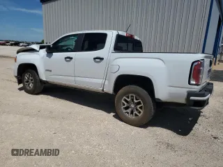 2022 GMC Canyon 4WD AT4 with VIN 1GTG6FEN2N1210072, listed as a Copart auction lot 53247005 with 64,897 mi miles and Salvage Title. Bid and sale history available at carsss.com. Image 2.
