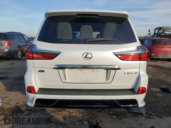 2020 Lexus LX 570 z VIN JTJDY7AX0L4327331, wystawiony jako Copart lot #44070415 z przebiegiem 43 887 mil mil oraz Szkoda całkowita • Salvage title. Historia ofert i sprzedaży dostępna na DreamBid. Obrazek 6.