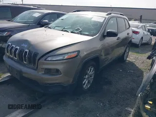 2017 Jeep Cherokee Altitude with VIN 1C4PJLAS7HW617482, listed as a IAAI auction lot 41226235 with 64,708 mi miles and . Bid and sale history available at DreamBid. Image 2.