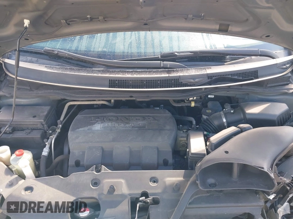 2011 Honda Odyssey Touring with VIN 5FNRL5H93BB104436, listed as a IAAI auction lot 40426003 with 93,342 mi miles and . Bid and sale history available at DreamBid. Image 10.