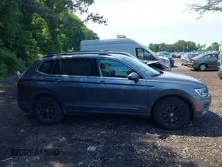 2018 Volkswagen Tiguan SEL with VIN 3VV2B7AXXJM020392, listed as a IAAI auction lot 42646948 with 58,685 mi miles and . Bid and sale history available at DreamBid. Image 13.