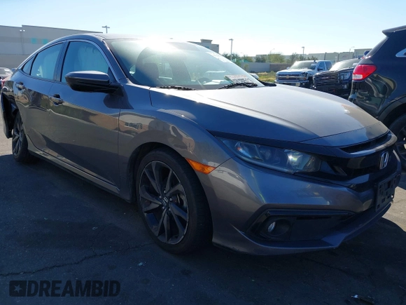 2021 Honda Civic Sedan Sport with VIN 19XFC2F88ME201751, listed as a IAAI auction lot 41643759 with 111,796 mi miles. Bid and sale history available at carsss.com. Image 1.