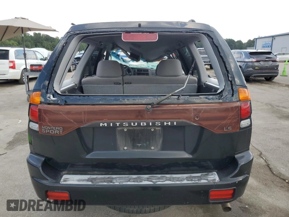 2002 Mitsubishi Montero ES z VIN JA4LS21H02J022594, wystawiony jako Copart lot #72750954 z przebiegiem 122 232 mil mil oraz Szkody całkowita. Historia ofert i sprzedaży dostępna na DreamBid. Obrazek 6.