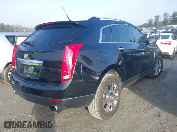 2011 Cadillac SRX Luxury Collection with VIN 3GYFNAEY2BS572385, listed as a IAAI auction lot 41138772 with 132,706 mi miles and . Bid and sale history available at DreamBid. Image 4.