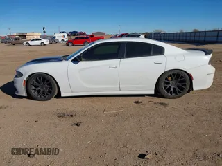 2021 Dodge Charger R/T with VIN 2C3CDXCT4MH588104, listed as a IAAI auction lot 41455312 with 72,162 mi miles and . Bid and sale history available at DreamBid. Image 14.