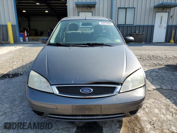 2007 Ford Focus S с VIN 1FAFP34N97W294489, выставлен на аукционе Copart как лот 60376985 с пробегом 155 295 миль миль и Списание • Salvage title. История ставок и продаж доступна на DreamBid. Изображение 5.