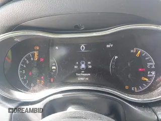 2021 Jeep Grand Cherokee Laredo E z VIN 1C4RJEAG9MC740244, wystawiony jako IAAI lot #42112847 z przebiegiem 32 897 mil mil oraz . Historia ofert i sprzedaży dostępna na DreamBid. Obrazek 7.