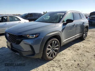 2023 Mazda CX-50 S Premium Plus z VIN 7MMVABEM2PN107512, wystawiony jako Copart lot #38534253 z przebiegiem 9 591 mil mil oraz . Historia ofert i sprzedaży dostępna na DreamBid. Obrazek 1.
