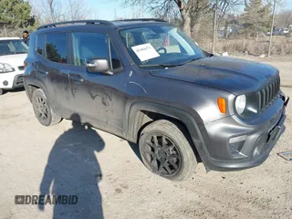 2020 Jeep Renegade Latitude z VIN ZACNJBBB8LPL33152, wystawiony jako IAAI lot #41464373 z przebiegiem 92 925 mil mil oraz . Historia ofert i sprzedaży dostępna na DreamBid. Obrazek 1.
