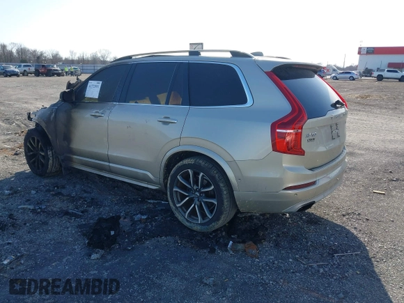 2016 Volvo XC90 T6 Momentum with VIN YV4A22PKXG1053114, listed as a IAAI auction lot 41772931 with Not Provided miles and . Bid and sale history available at carsss.com. Image 3.