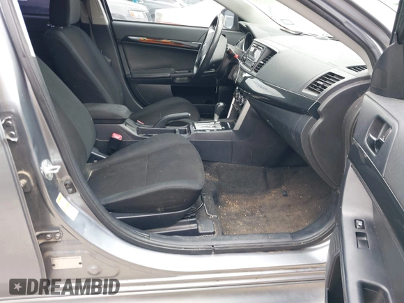 2016 Mitsubishi Lancer ES with VIN JA32U2FU4GU008977, listed as a IAAI auction lot 42139304 with 145,521 mi miles. Bid and sale history available at carsss.com. Image 5.