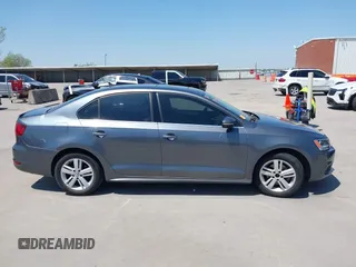 2013 Volkswagen Jetta Sedan Hybrid SE with VIN 3VW637AJ9DM228757, listed as a IAAI auction lot 41990054 with 176,365 mi miles. Bid and sale history available at carsss.com. Image 13.