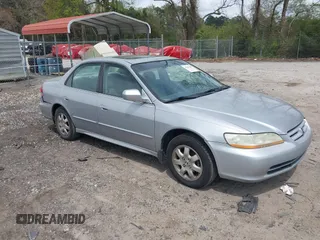 2002 Honda Accord EX z VIN 1HGCG56642A161161, wystawiony jako IAAI lot #41966381 z przebiegiem 258 103 mil mil oraz . Historia ofert i sprzedaży dostępna na DreamBid. Obrazek 1.