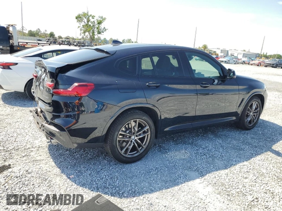 2021 BMW X4 xDrive30i z VIN 5UX2V1C09M9G11692, wystawiony jako Copart lot #51512115 z przebiegiem 16 948 mil mil oraz Szkoda całkowita • Salvage title. Historia ofert i sprzedaży dostępna na DreamBid. Obrazek 3.