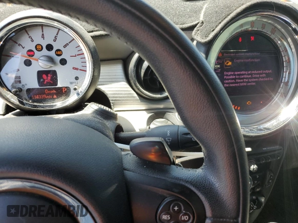 2012 MINI Coupe S z VIN WMWSX3C53CT155039, wystawiony jako Copart lot #56140175 z przebiegiem 114 339 mil mil oraz Nie do naprawy • Non repairable. Historia ofert i sprzedaży dostępna na DreamBid. Obrazek 9.