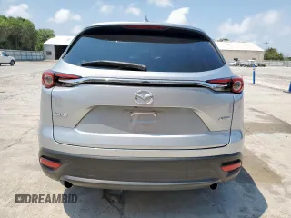 2017 Mazda CX-9 Sport с VIN JM3TCABY0H0134894, выставлен на аукционе Copart как лот 58217865 с пробегом 100 227 миль миль и Списание • Salvage title. История ставок и продаж доступна на DreamBid. Изображение 6.