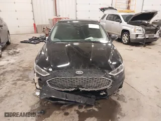 2020 Ford Fusion Hybrid Titanium with VIN 3FA6P0RU8LR141355, listed as a IAAI auction lot 41417807 with 61,288 mi miles. Bid and sale history available at carsss.com. Image 12.