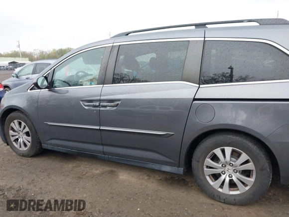 2014 Honda Odyssey EX-L with VIN 5FNRL5H63EB033684, listed as a IAAI auction lot 42025249 with 128,017 mi miles and . Bid and sale history available at carsss.com. Image 14.