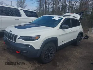 2019 Jeep Cherokee Trailhawk Elite with VIN 1C4PJMBX4KD207368, listed as a IAAI auction lot 41898251 with 49,847 mi miles. Bid and sale history available at carsss.com. Image 2.