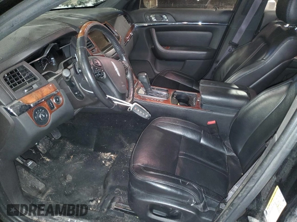 2013 Lincoln MKS with VIN 1LNHL9DK6DG606079, listed as a Copart auction lot 87322174 with 133,383 mi miles and Salvage Title. Bid and sale history available at DreamBid. Image 7.