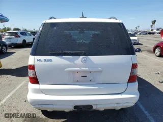 2002 Mercedes-Benz M-Class with VIN 4JGAB54E12A318056, listed as a Copart auction lot 47465095 with 176,355 mi miles and Salvage Title. Bid and sale history available at carsss.com. Image 6.
