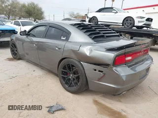 2012 Dodge Charger SXT with VIN 2C3CDXHG8CH244592, listed as a IAAI auction lot 41548991 with 116,855 mi miles. Bid and sale history available at carsss.com. Image 3.