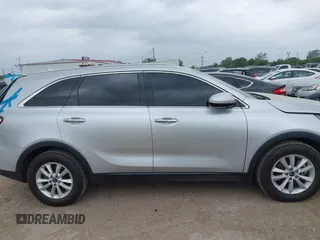 2019 Kia Sorento LX z VIN 5XYPG4A5XKG447654, wystawiony jako IAAI lot #41943667 z przebiegiem 84 241 mil mil oraz . Historia ofert i sprzedaży dostępna na DreamBid. Obrazek 13.
