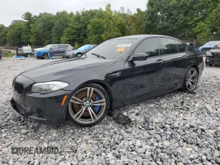 2013 BMW M5 with VIN WBSFV9C53DD096852, listed as a Copart auction lot 65917404 with 0 mi miles and Salvage Title. Bid and sale history available at carsss.com. Image 1.