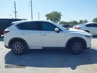 2018 Mazda CX-5 Grand Touring with VIN JM3KFADM2J1422512, listed as a IAAI auction lot 42010801 with 48,567 mi miles and . Bid and sale history available at DreamBid. Image 13.
